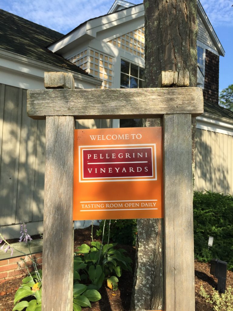 A sign that says welcome to pelletier vineyards.